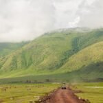 Safari jeep in Ngorongoro landscape for private safari from Arusha