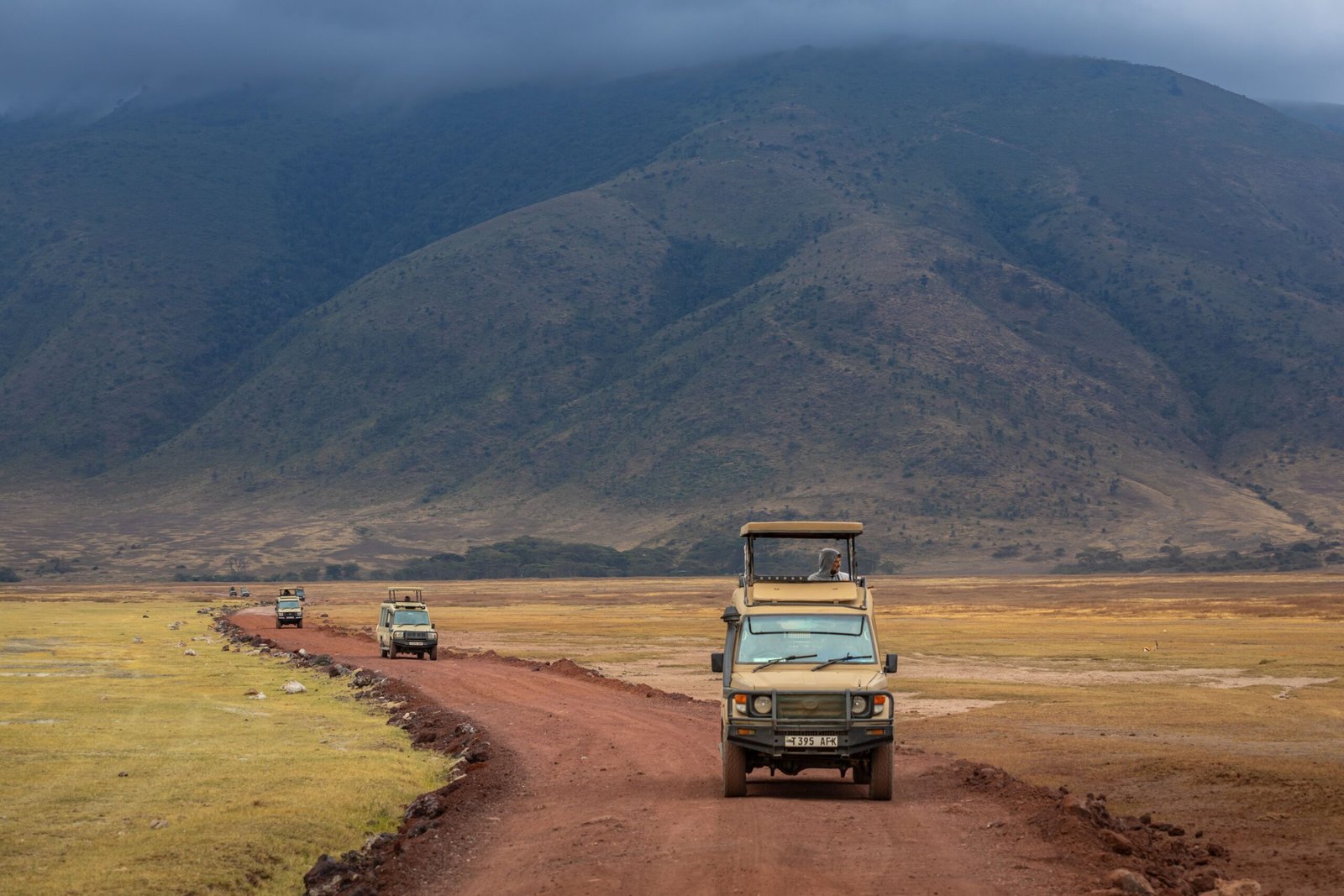 Safari vehicles on a private safari route from Arusha
